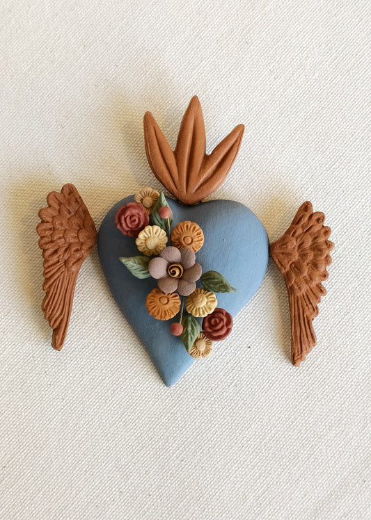 Milagrito fleuri avec ailes